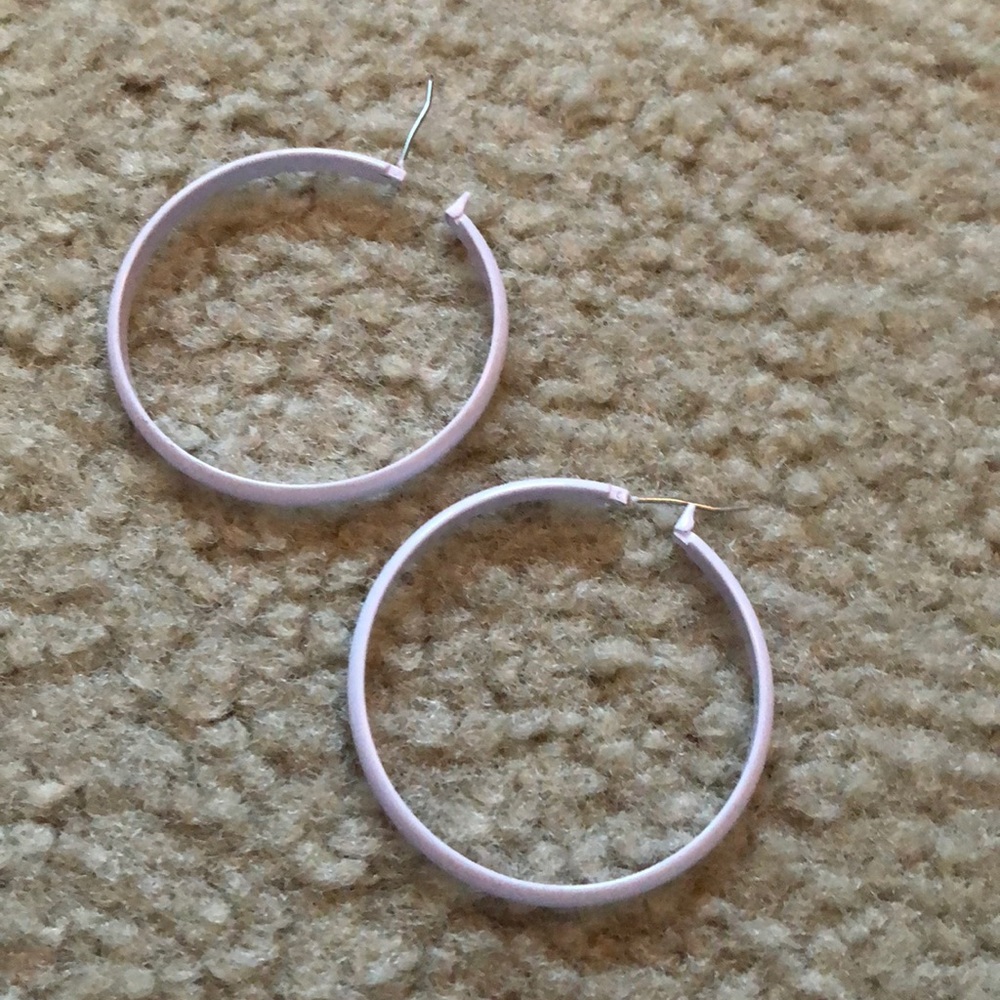 White hoop metal earrings